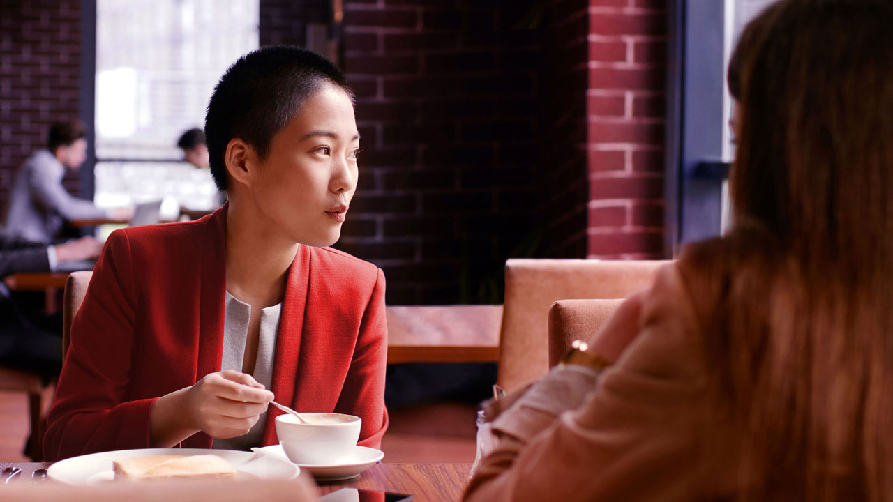 Woman having coffee