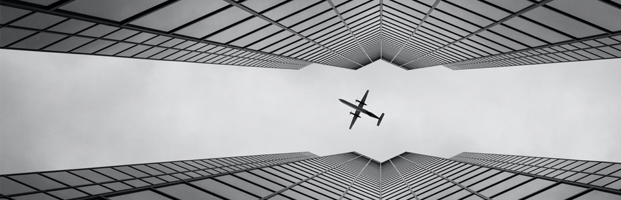 Monochrome picture of a passing plane